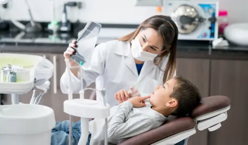 I denti dei bambini potrebbero nascondere sintomi di celiachia