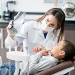 I denti dei bambini potrebbero nascondere sintomi di celiachia